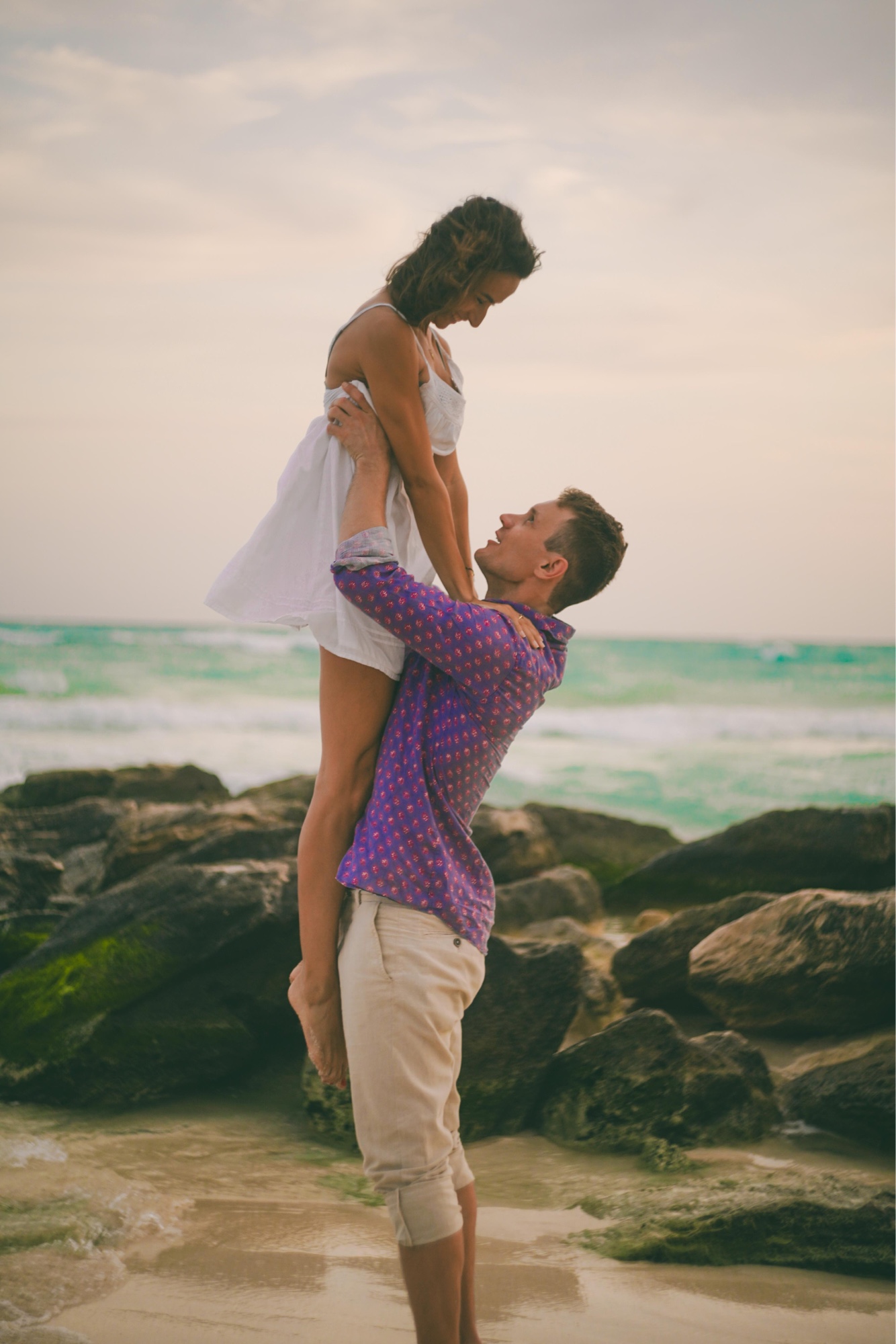 Couple on the beach at golden hour, Cancún