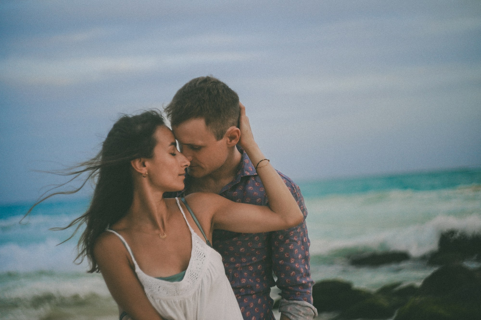 Couple at sunset on the beach, Riviera Maya