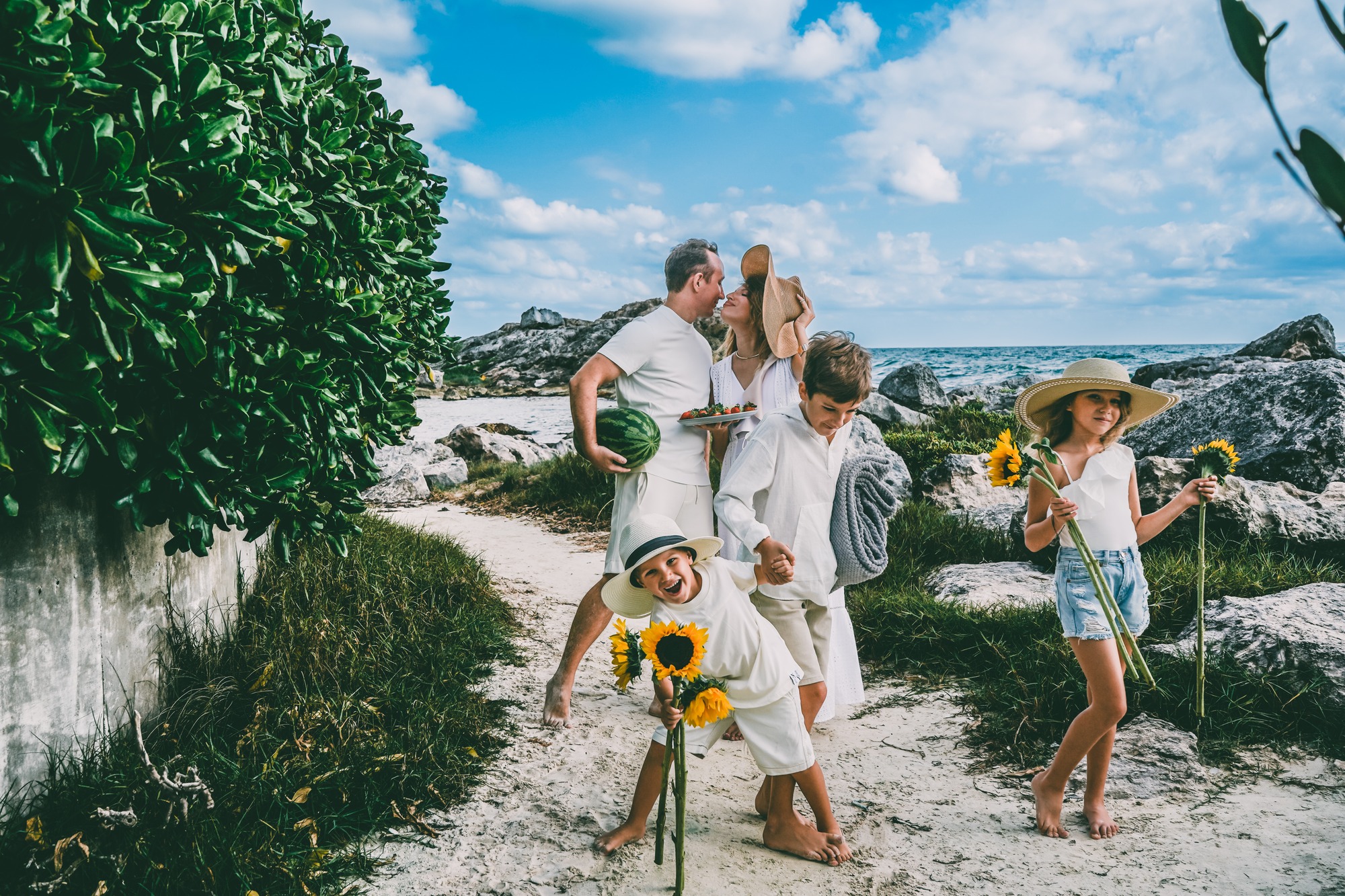 Family on the beach, Riviera Maya